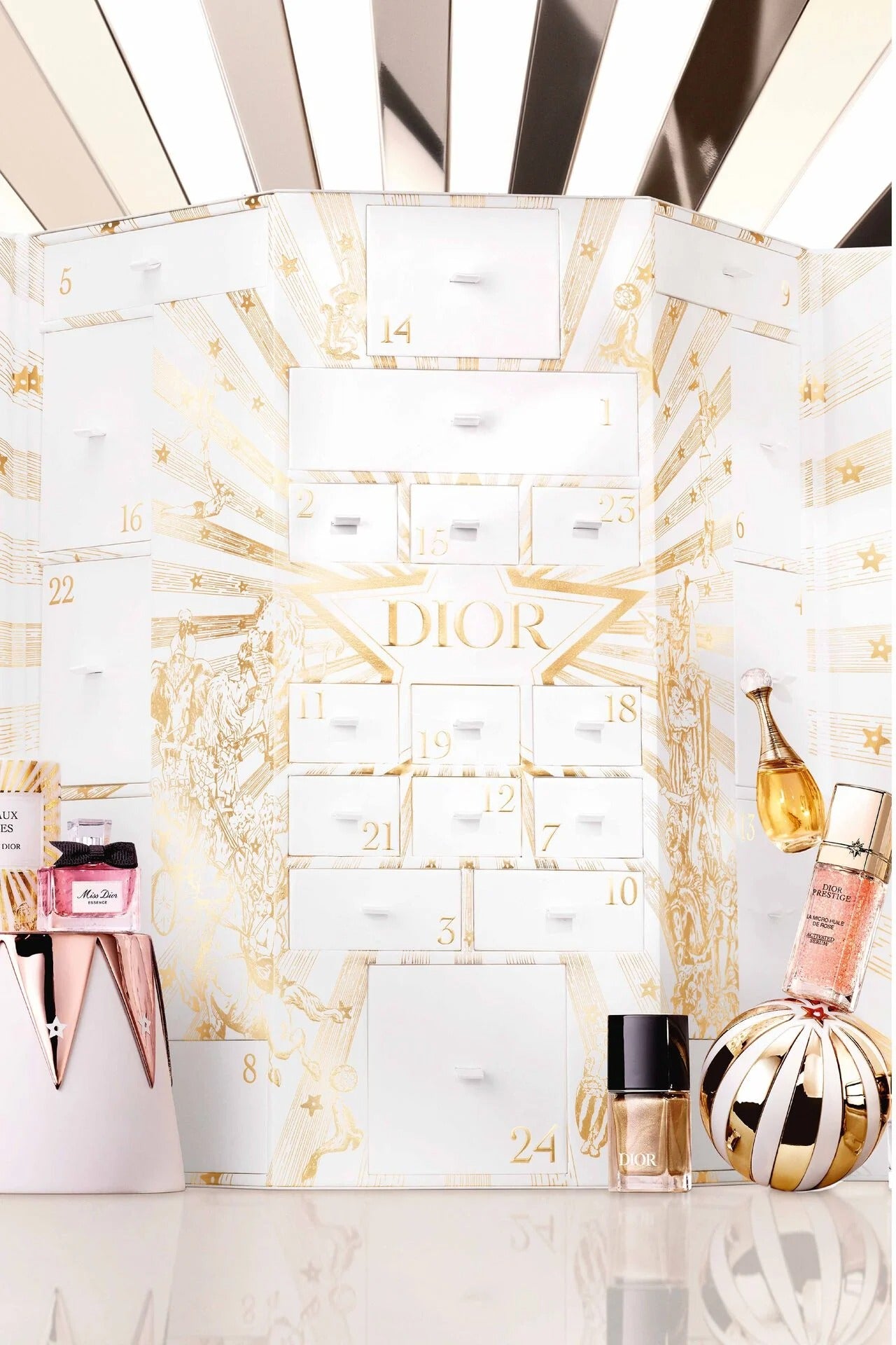 Dior advent calendar with perfume bottles on a white background
